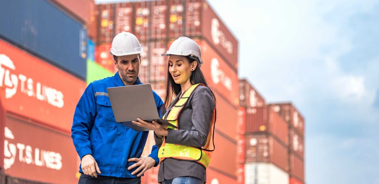 industrial-workers-collaborating-with-laptop-in-sh-2026-08-20-18-45-45-utc (1)